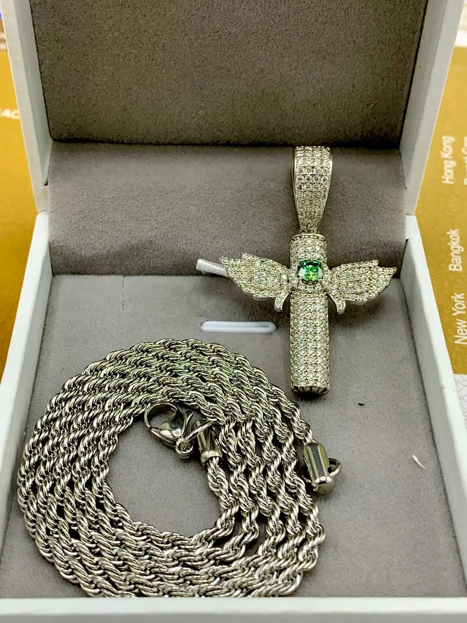 Luxury Iced-Out Angel Wing Cross Pendant Necklace & Clover Stud Earring Set – 18K White Gold Finish with Green Gem Accents